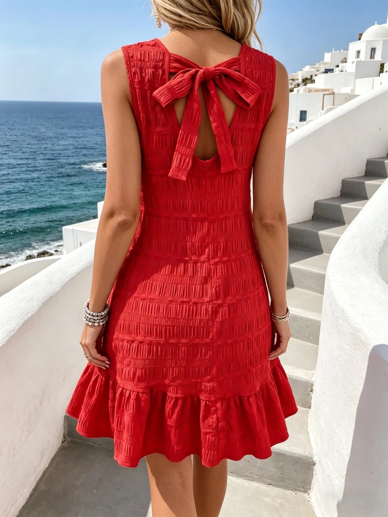 Women's Red Textured Smocked Sleeveless Mini Dress with Back Bow Tie & Ruffle Hem Casual A-Line Sundress for Beach Vacation