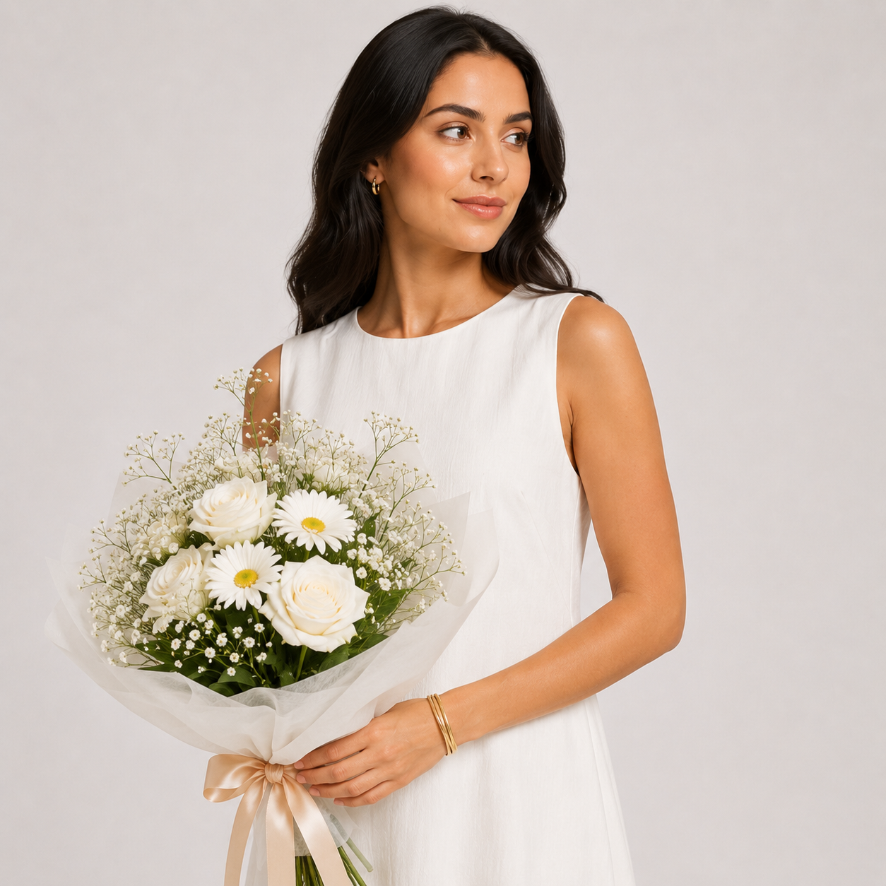 Woman wearing a white sleeveless dress on a white background