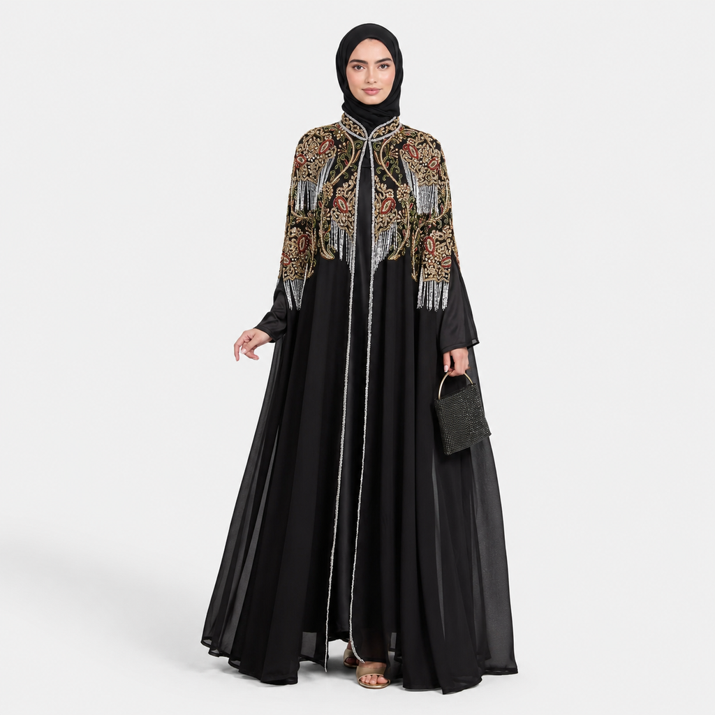 Woman wearing a black hijab and an intricately designed jacket with gold and red patterns on a white background