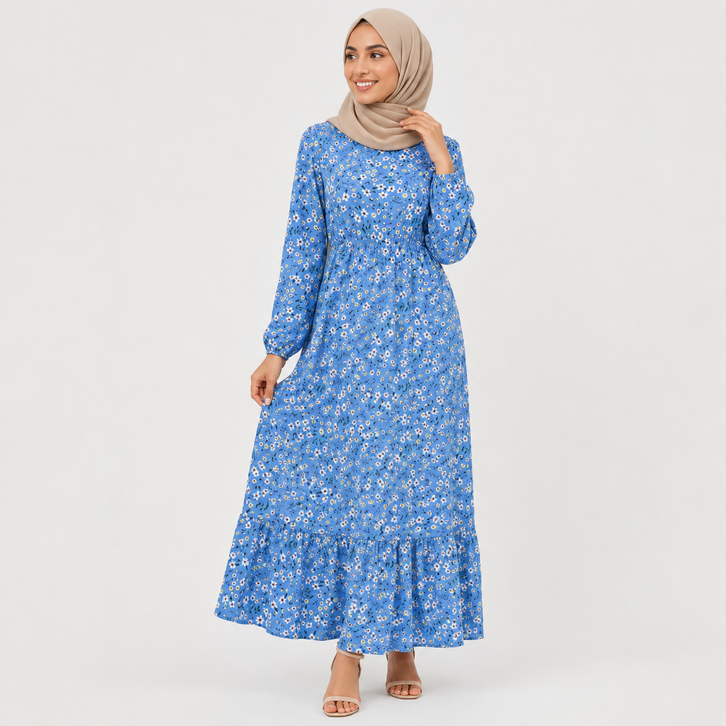 Woman wearing a blue floral dress on a white background