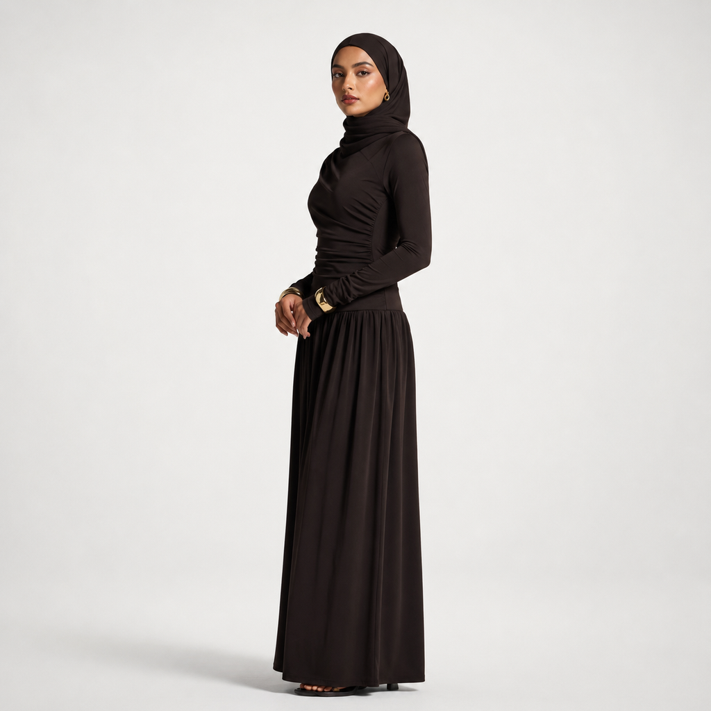 Woman wearing a black outfit on a white background
