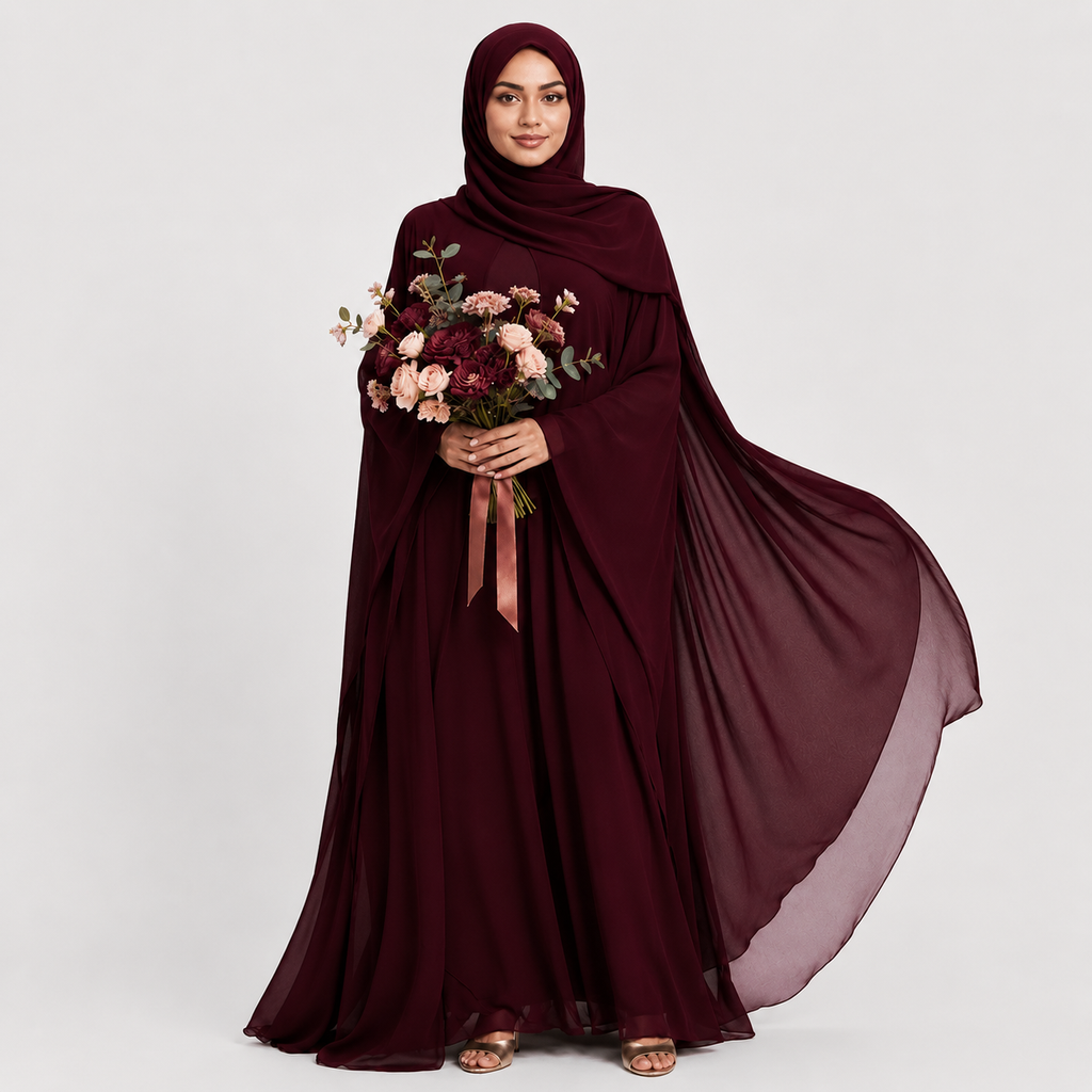 Woman wearing a burgundy abaya holding flowers on a white background