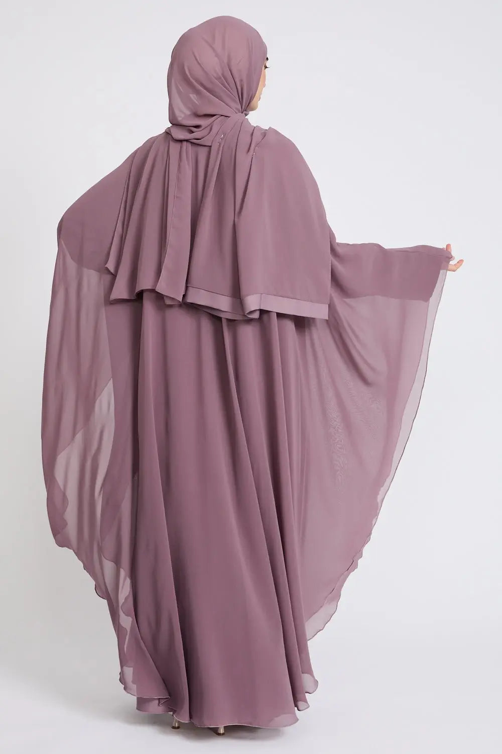 Mauve abaya with a matching hijab on a white background