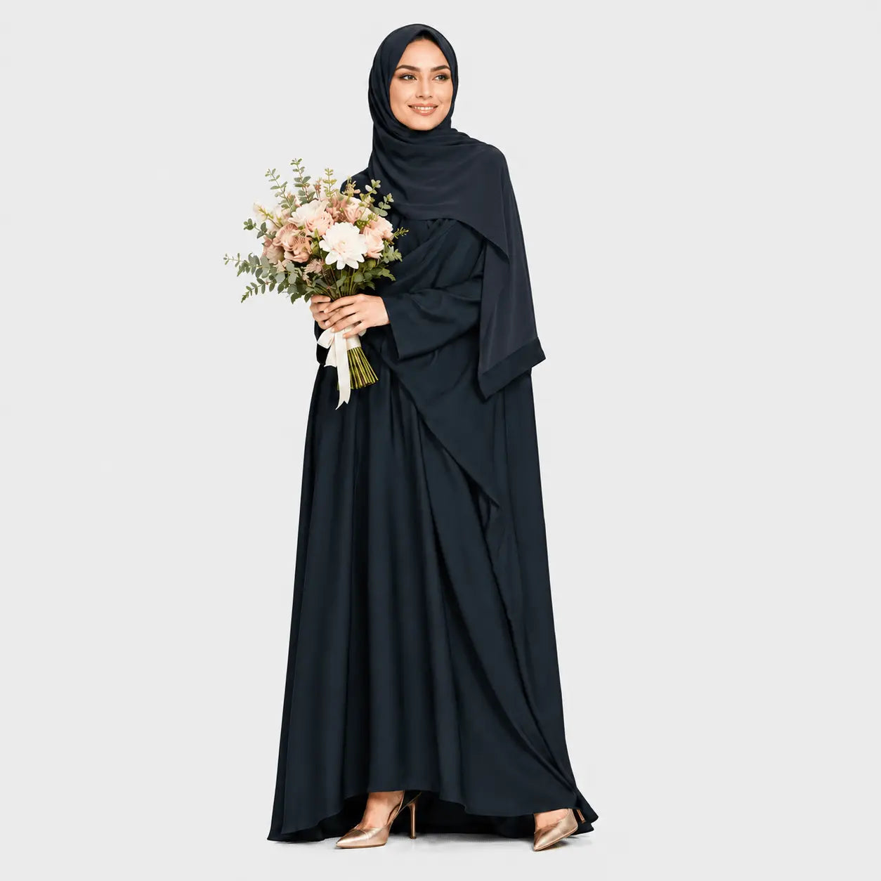 Woman in a black abaya holding a bouquet of flowers on a light gray background