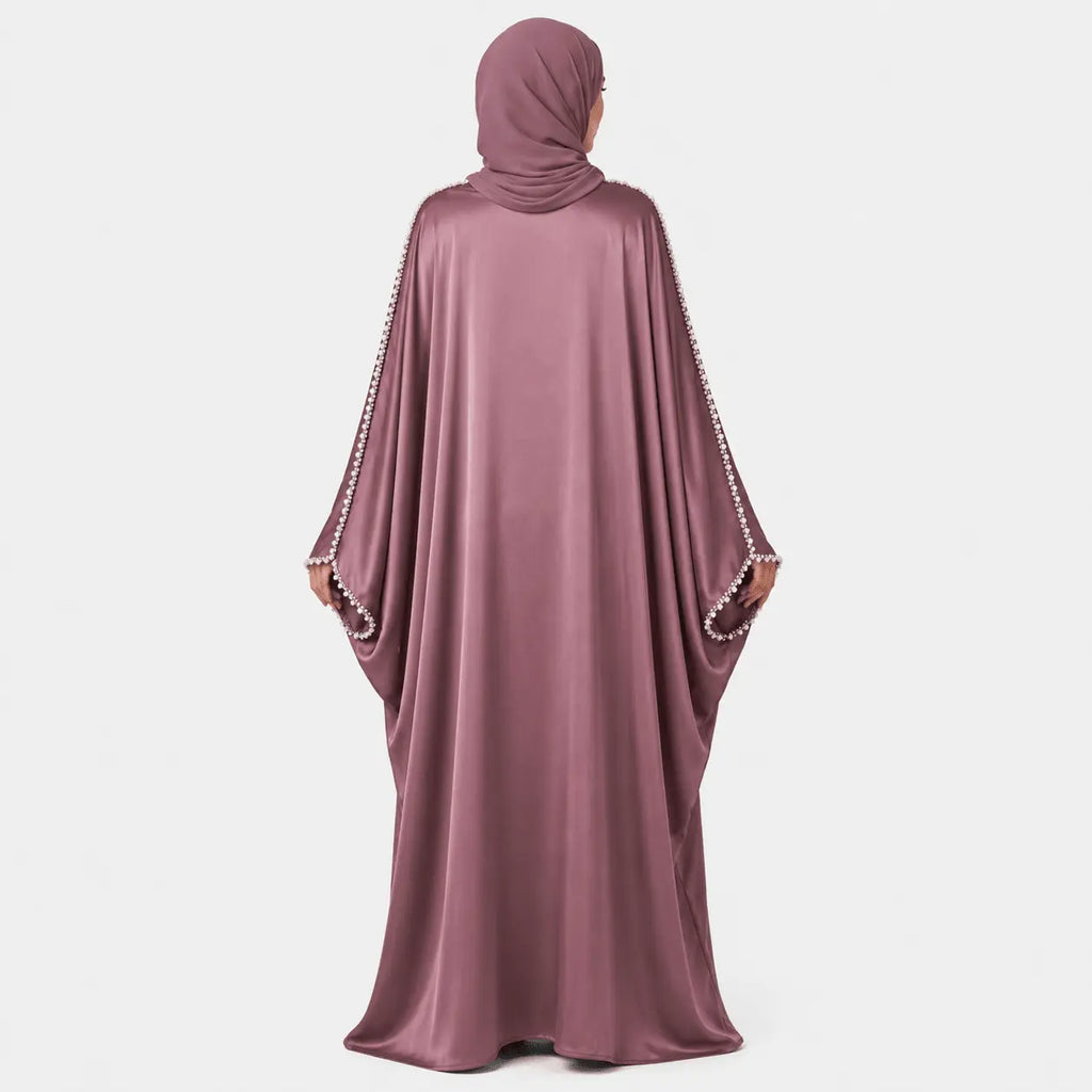 Mauve abaya with embellished sleeves on a white background