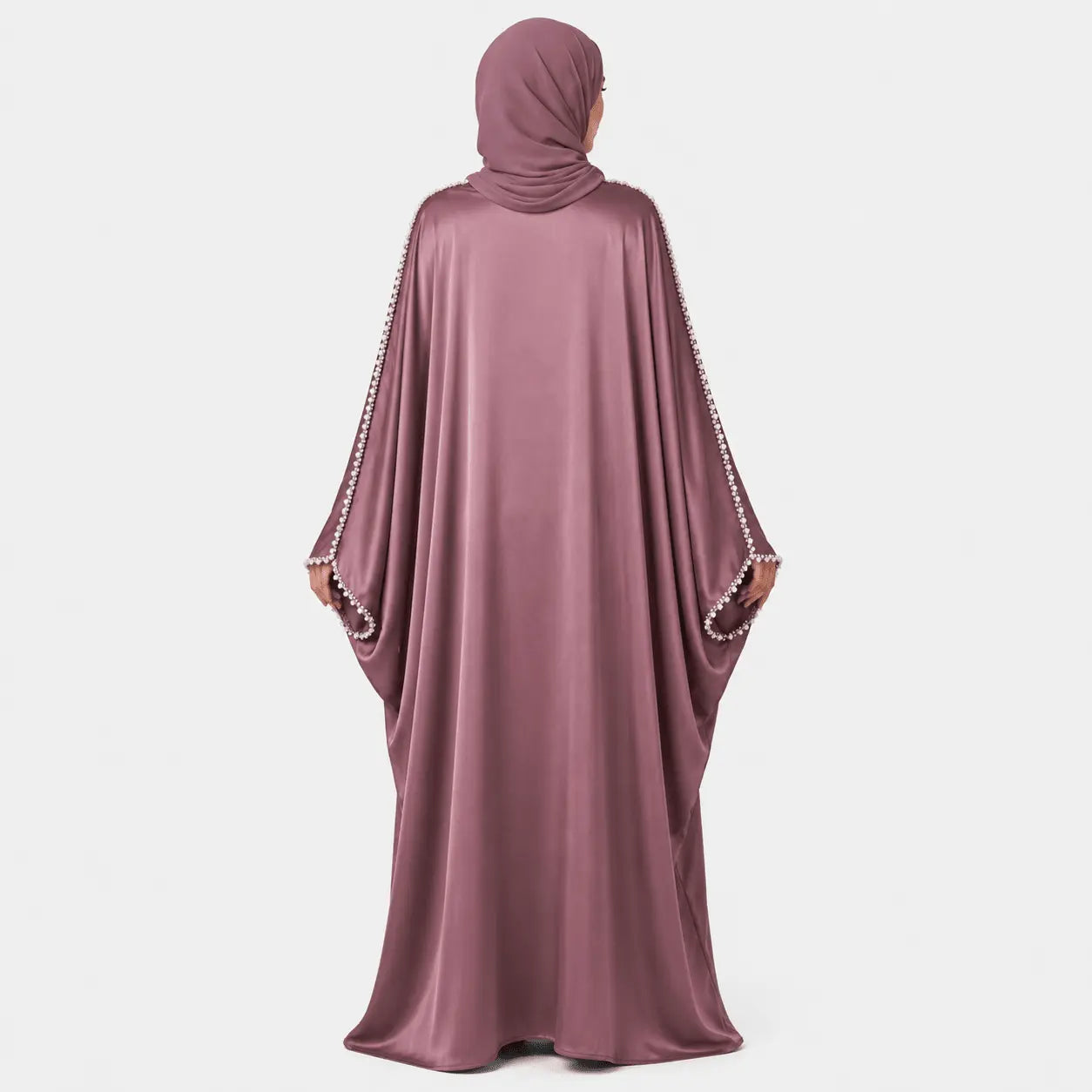 Mauve abaya with embellished sleeves on a white background