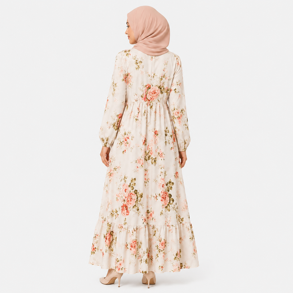 Woman wearing a floral dress with a plain background