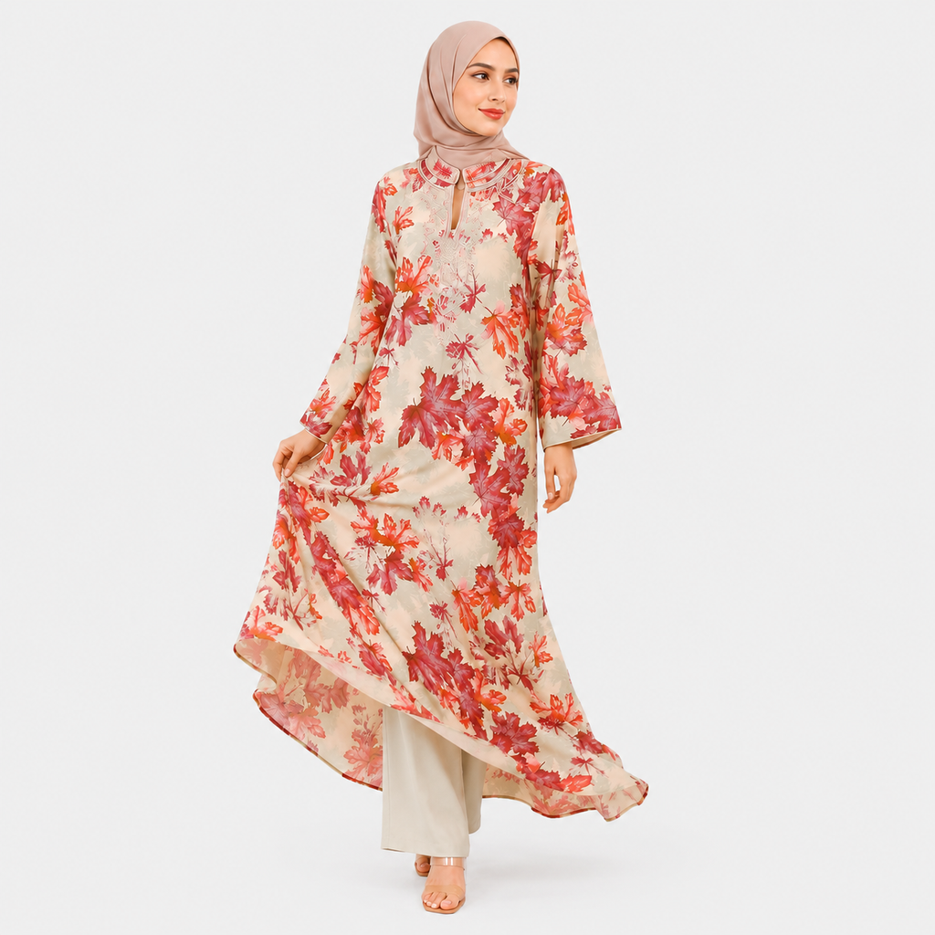 Woman wearing a floral dress with a hijab on a white background