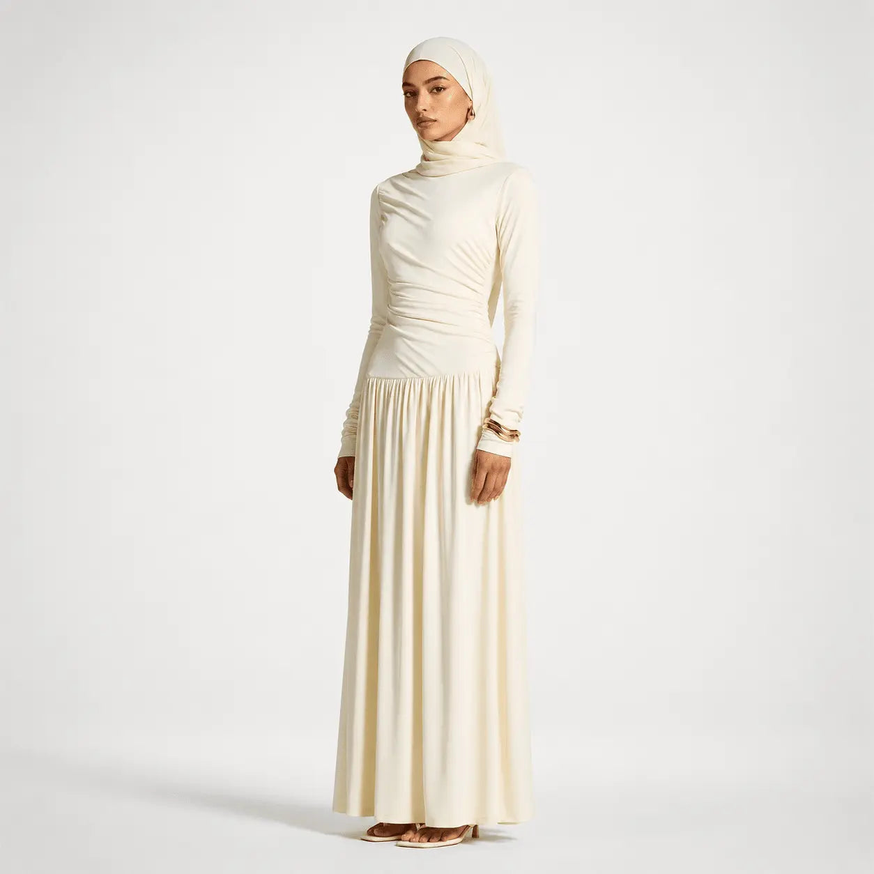 Cream modest long dress with hijab, ruched bodice, and flowy skirt for elegant everyday wear