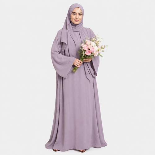 Woman in a long, light purple dress holding a bouquet of flowers on a white background