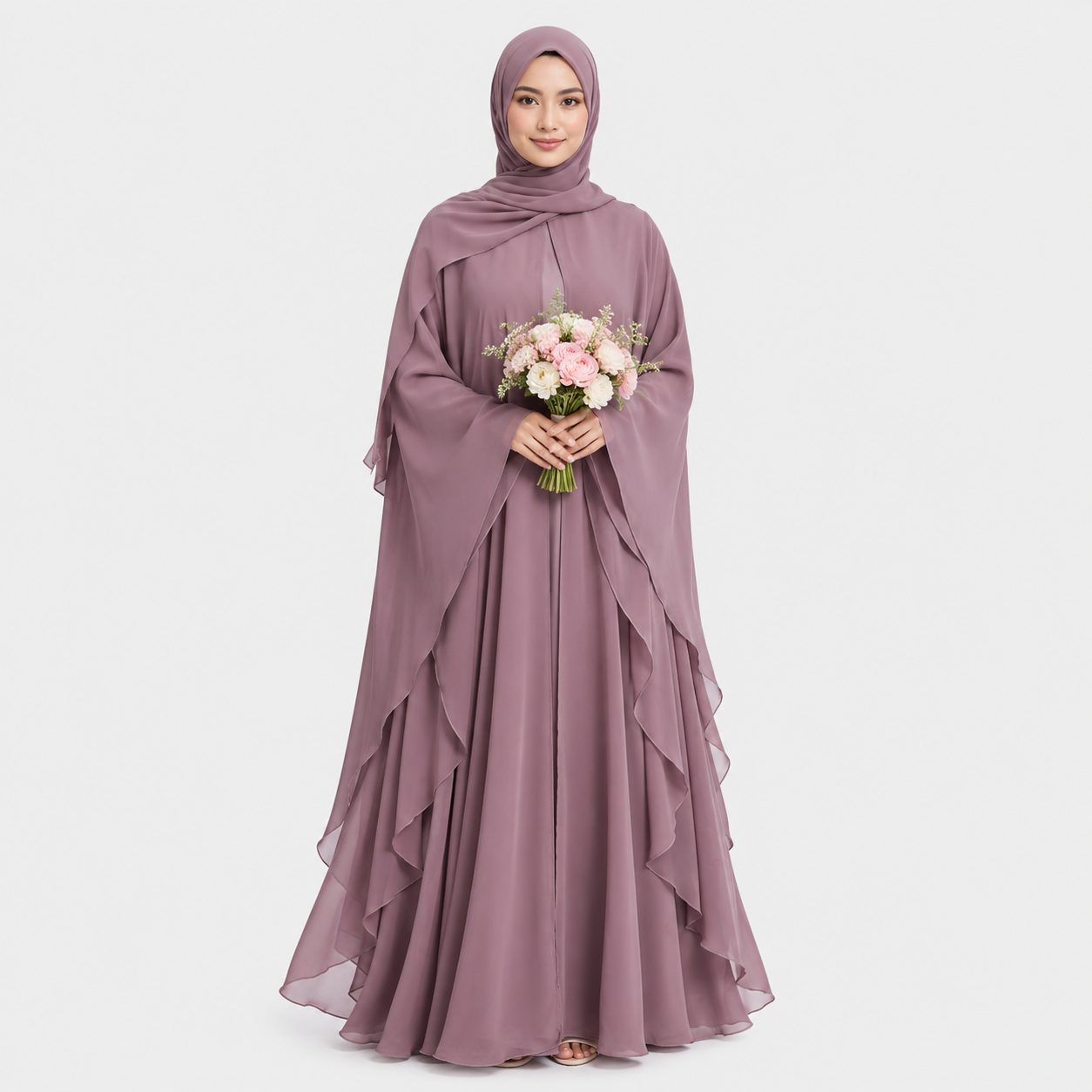 Woman wearing a long, light purple dress holding flowers on a white background