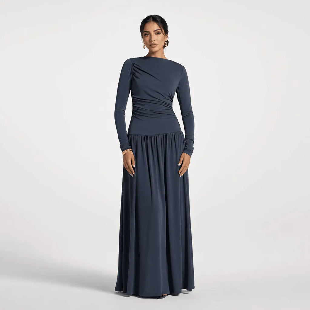 Navy blue long sleeve maxi dress with ruched bodice and flowy skirt for formal events