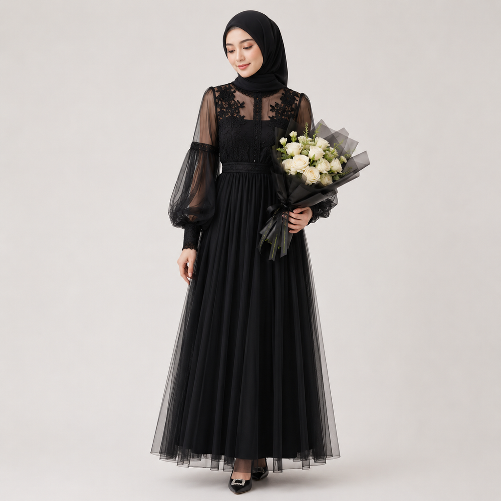 Woman wearing a black dress with sheer sleeves holding flowers on a white background