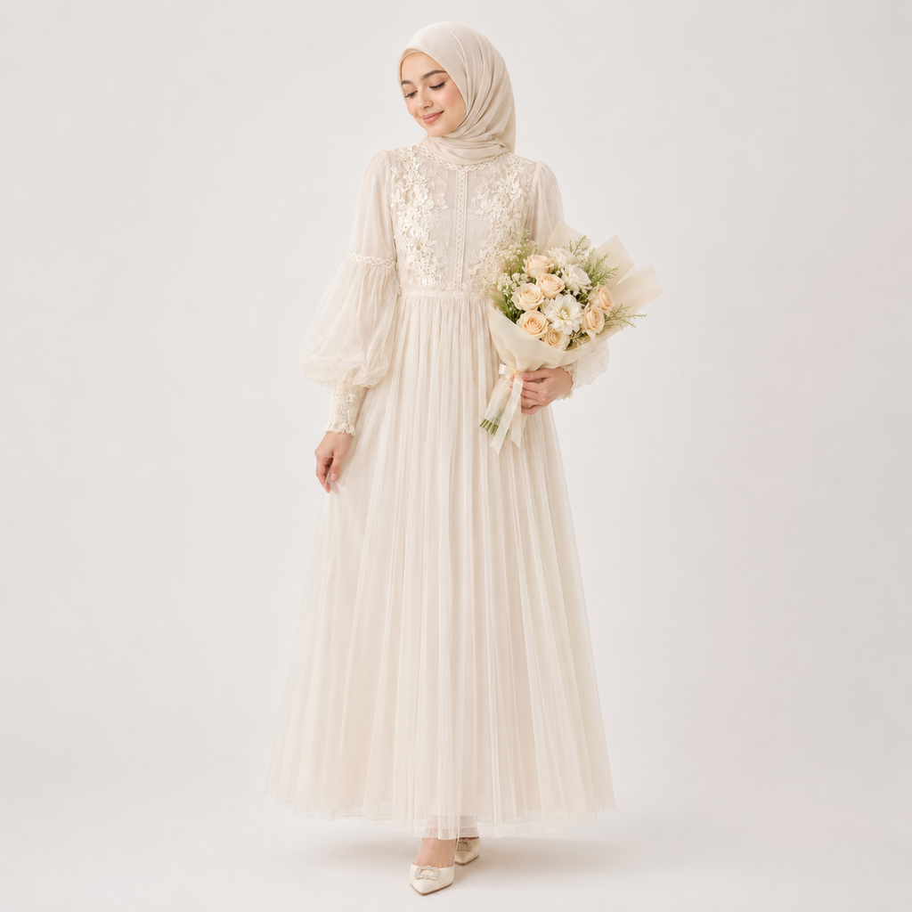 Woman in a long, light-colored dress holding flowers against a white background