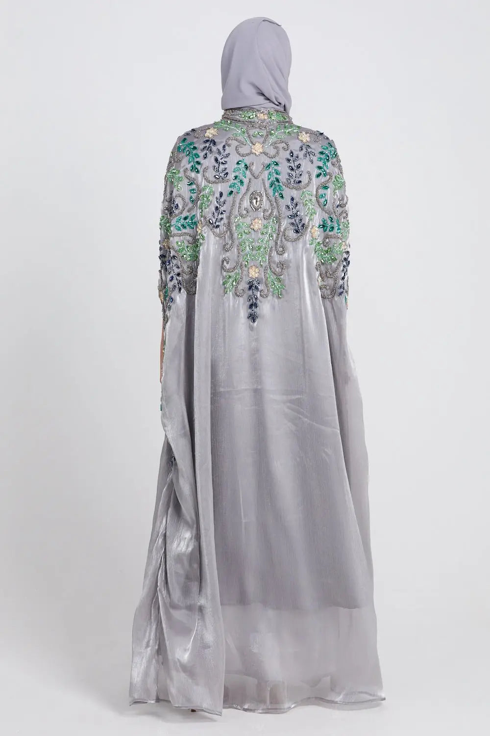 Gray dress with floral embroidery on a white background