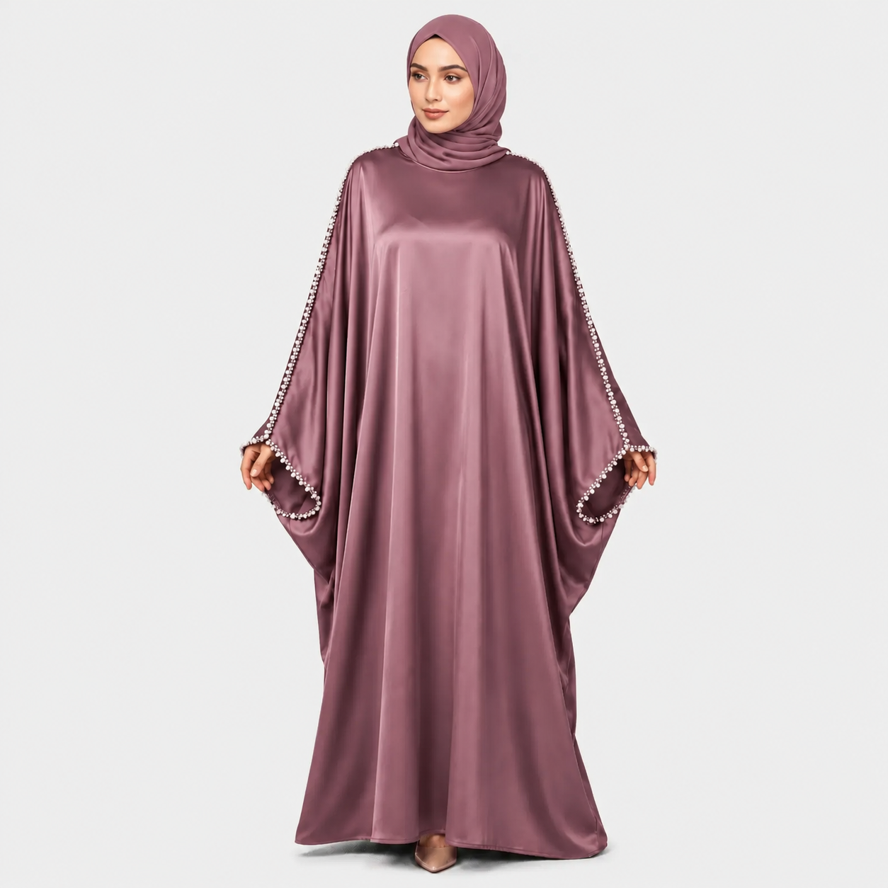 Mauve abaya with embellished sleeves on a white background