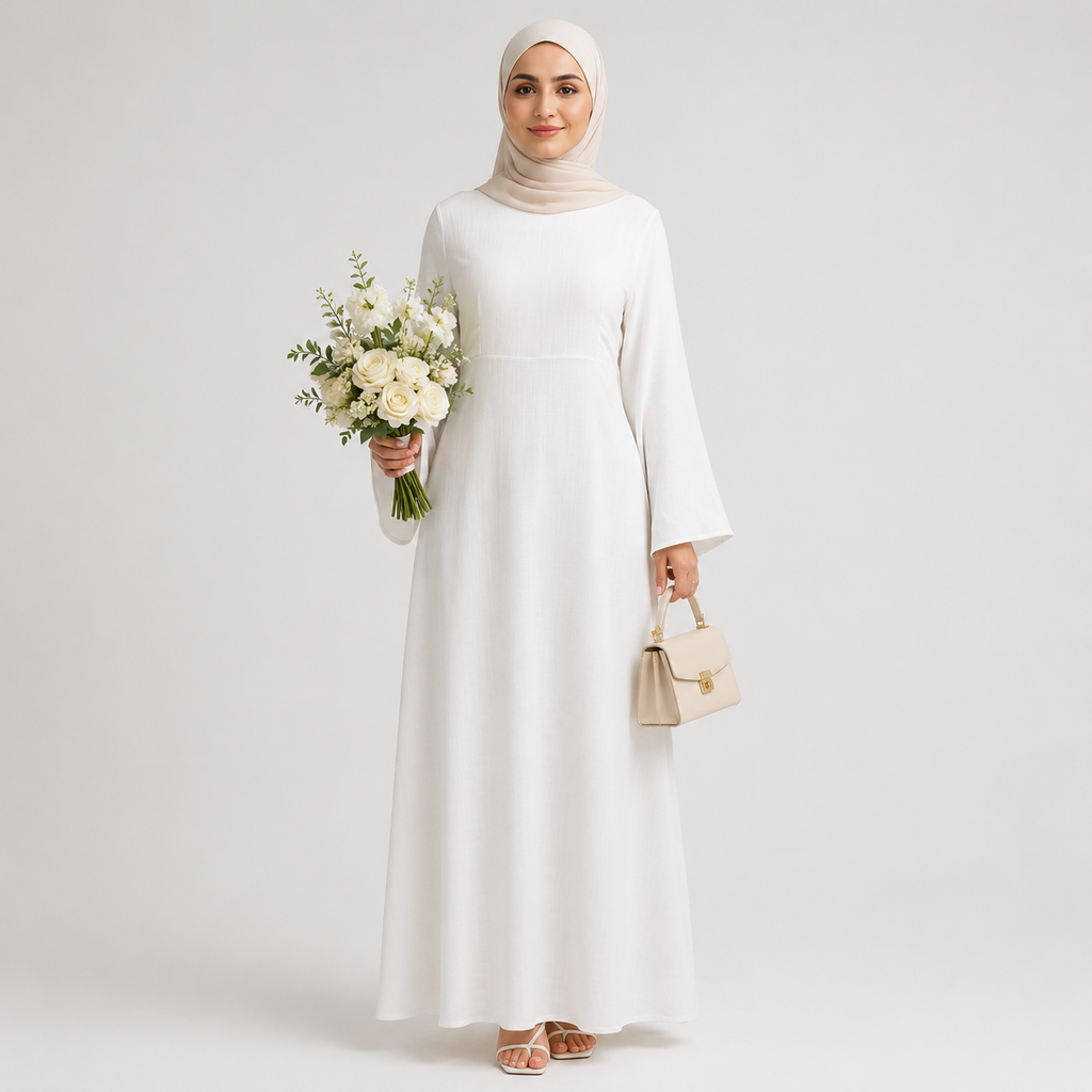 White modest abaya dress styled with beige hijab, floral bouquet, and cream handbag on a clean studio background

