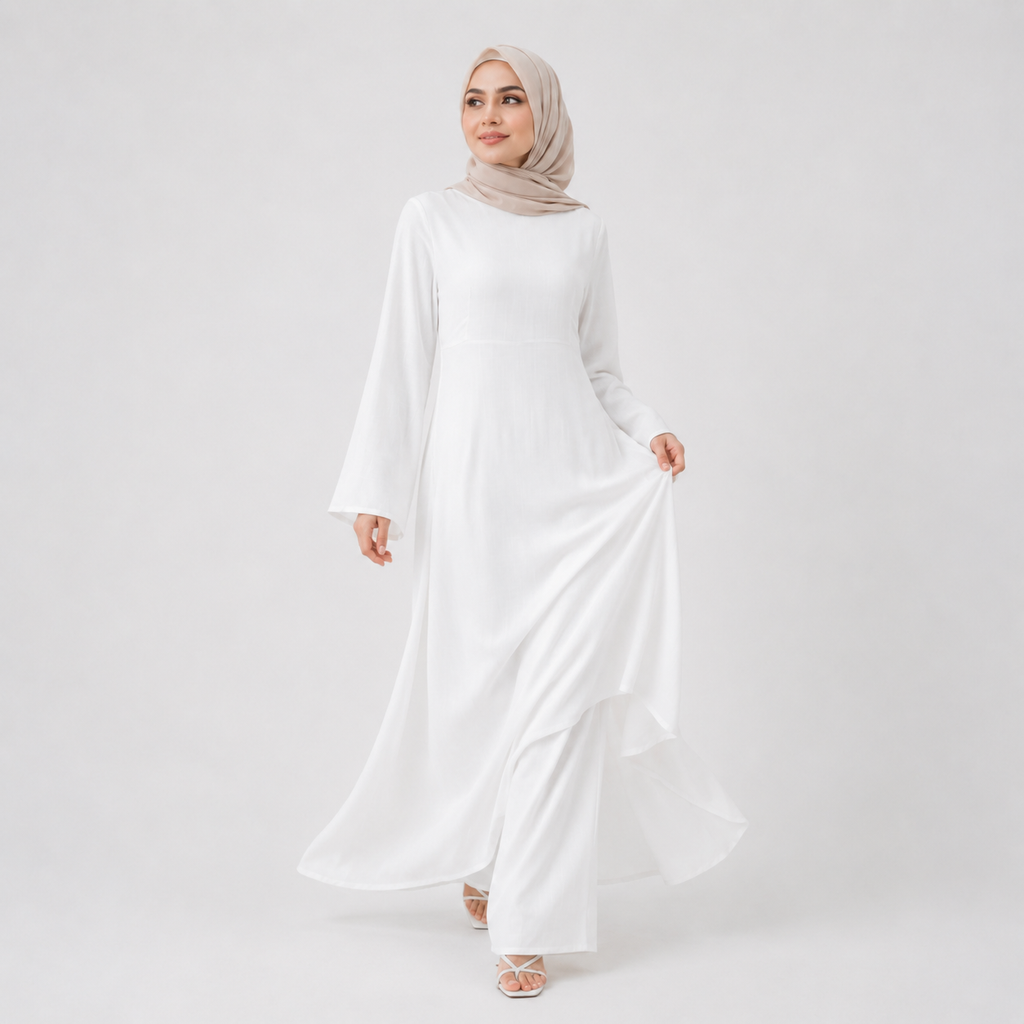 White modest abaya dress styled with beige hijab, floral bouquet, and cream handbag on a clean studio background
