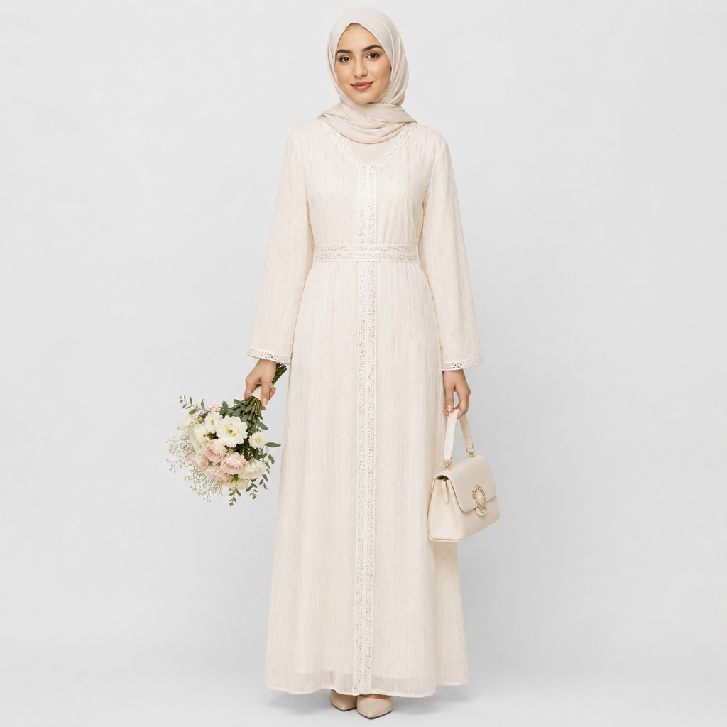 Woman in white lace modest dress with hijab, elegant long sleeves, and soft fabric texture