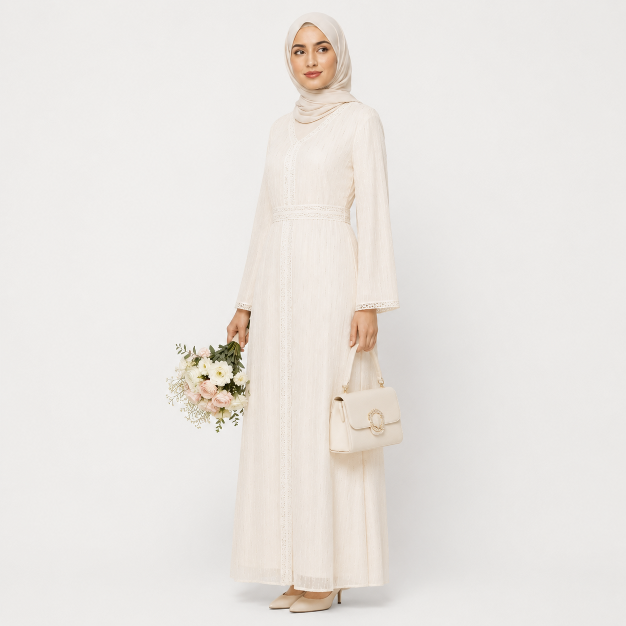 Woman in white lace modest dress with hijab, elegant long sleeves, and soft fabric texture