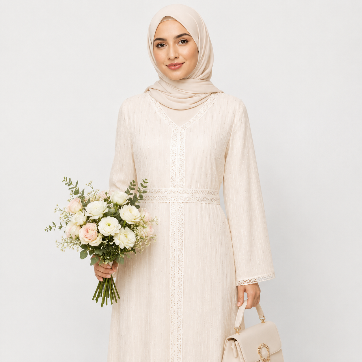 Woman in white lace modest dress with hijab, elegant long sleeves, and soft fabric texture