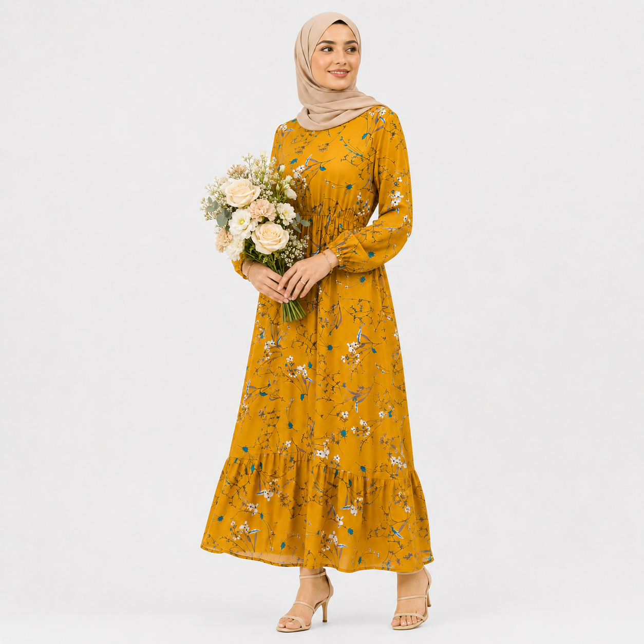 Woman wearing a yellow floral dress holding flowers on a white background